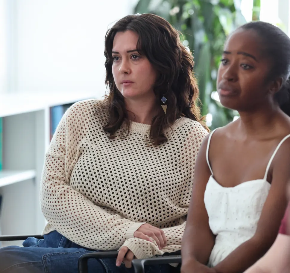 Two participants listen during a session at a Meridian Transformative Learning Lab