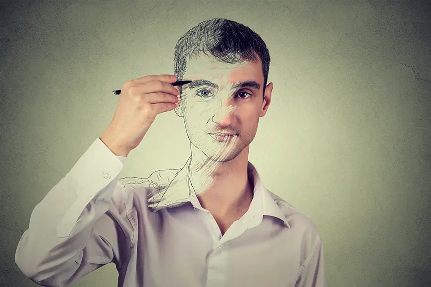 A man is depicted with a sketch overlay on half of his face as he draws on it with a pencil, set against a textured green background.