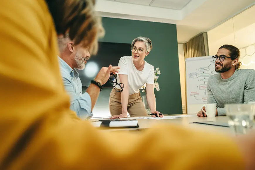 Happy businesspeople having a discussion